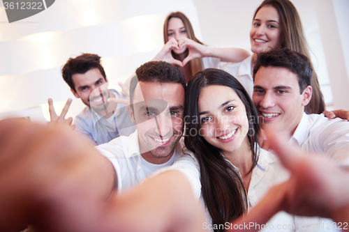 Image of group of friends taking selfie