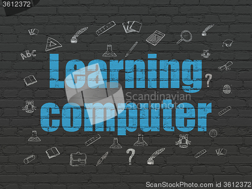 Image of Education concept: Learning Computer on wall background