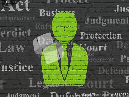 Image of Law concept: Business Man on wall background