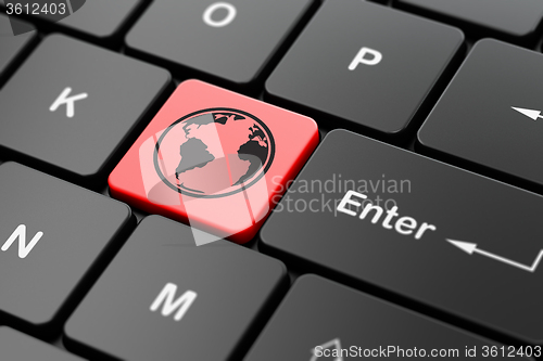 Image of Science concept: Globe on computer keyboard background