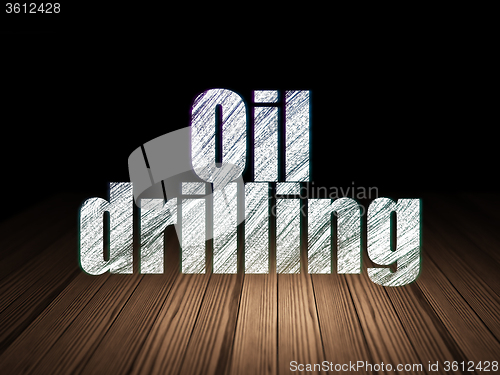 Image of Industry concept: Oil Drilling in grunge dark room