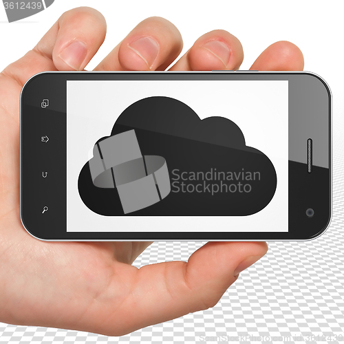 Image of Cloud computing concept: Hand Holding Smartphone with Cloud on display