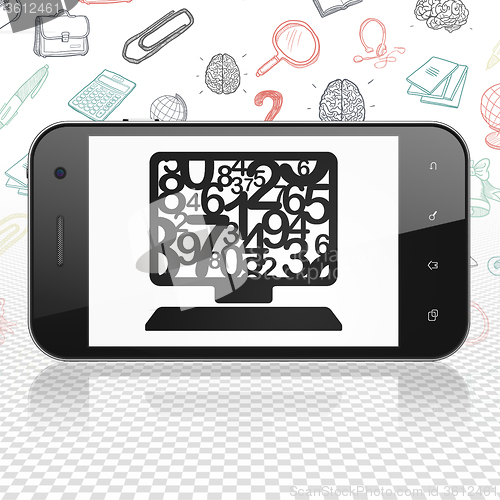 Image of Learning concept: Smartphone with Computer Pc on display