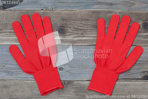 Image of red working gloves