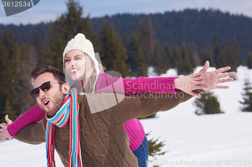 Image of romantic young couple on winter vacation