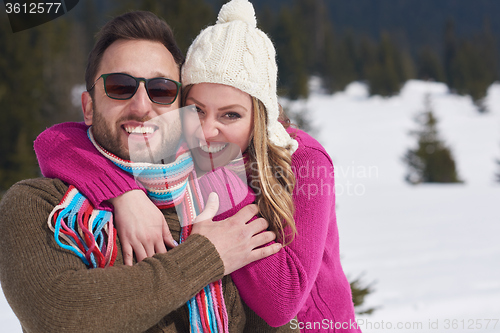 Image of romantic young couple on winter vacation