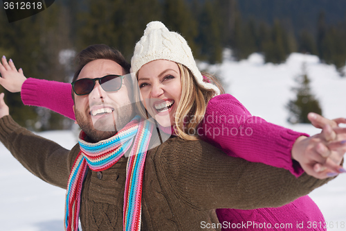 Image of romantic young couple on winter vacation