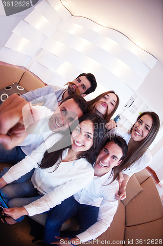 Image of group of friends taking selfie