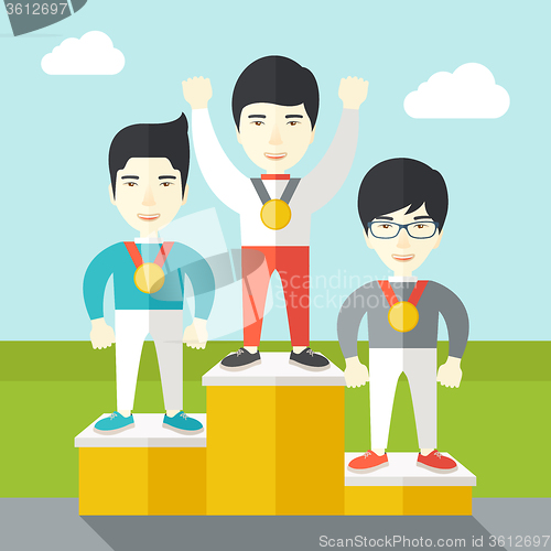Image of Cheerful winners on pedestal.