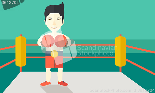 Image of Boxer in gloves standing on ring.
