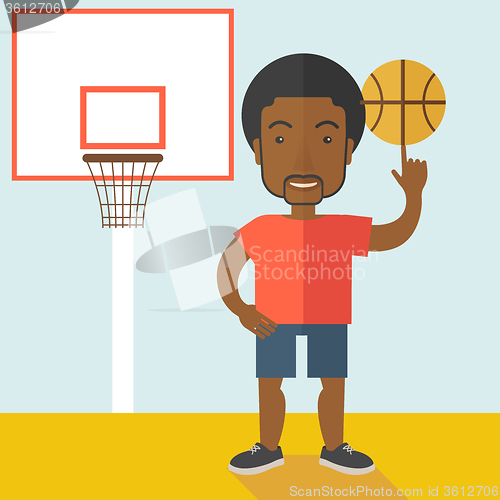 Image of Basketball player spinning ball.