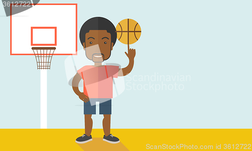 Image of Basketball player spinning ball.