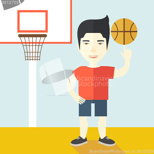 Image of Basketball player spinning ball.