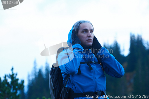 Image of advanture man with backpack hiking