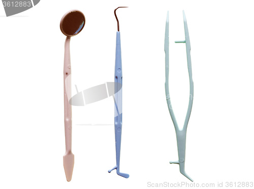 Image of Retro look Dentist tools isolated