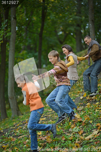 Image of Happy family running