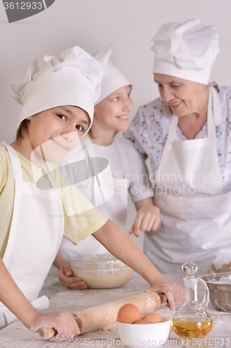 Image of woman and her grandchildren