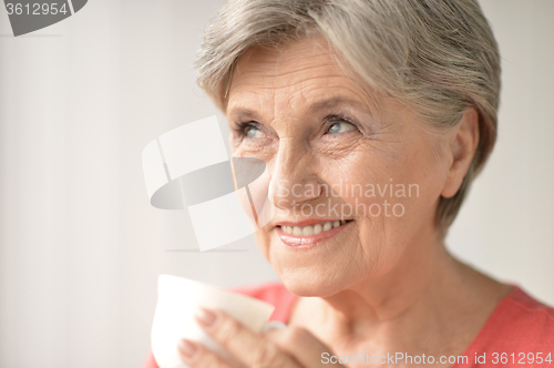 Image of  woman with cup 