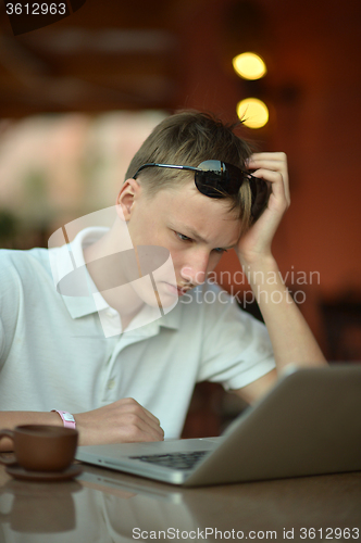 Image of  boy with laptop 