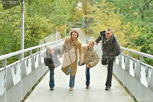 Image of Happy Family walking