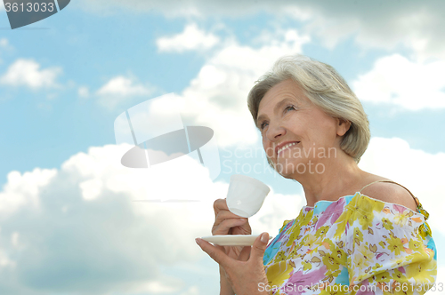Image of woman with cup 
