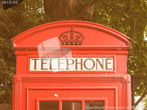 Image of Retro looking Red phone box in London