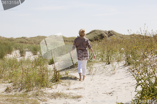 Image of Vacationer in dune landscape