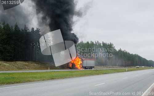 Image of The burning truck on the road