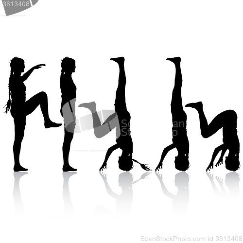 Image of Black silhouette  woman in yoga pose on white background. 