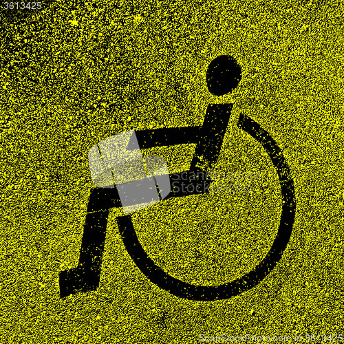 Image of Parking places with disabled signs  on asphalt. 