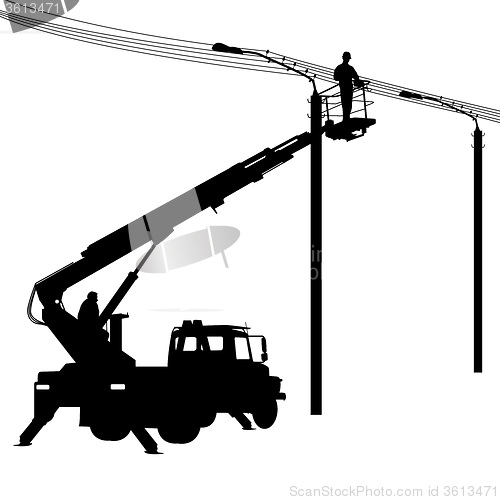 Image of Electrician, making repairs at a power pole. 
