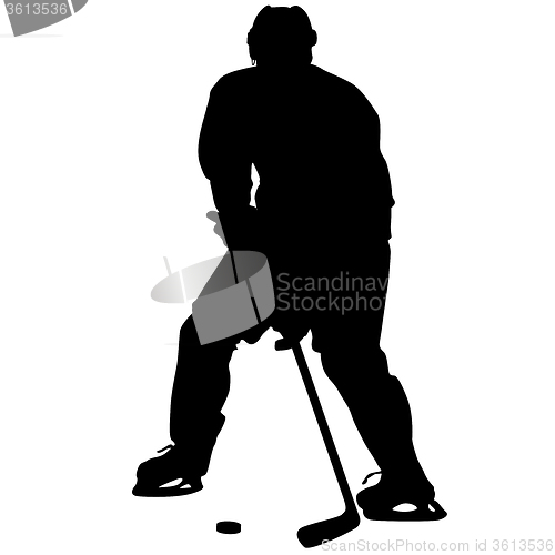 Image of silhouette of hockey player. Isolated on white. 