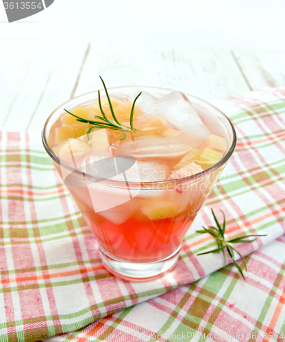 Image of Lemonade with rhubarb and rosemary on napkin