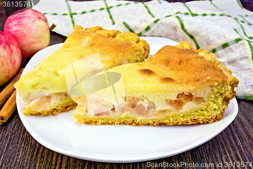 Image of Pie apple with sour cream and cinnamon on dark board