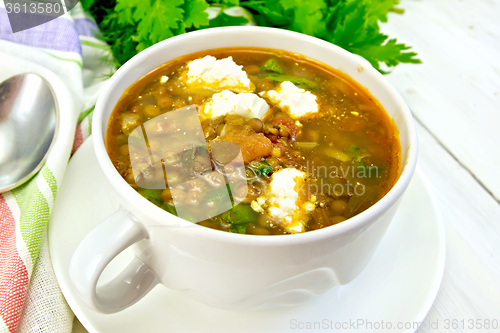 Image of Soup lentil with spinach and feta on light board