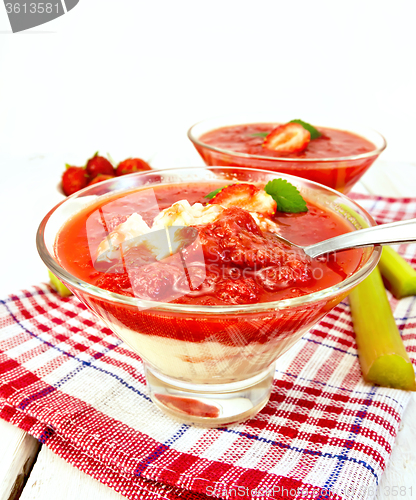 Image of Dessert strawberry-vanilla and rhubarb in two glassful on napkin