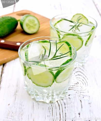 Image of Lemonade with cucumber and rosemary in two glassful on white boa