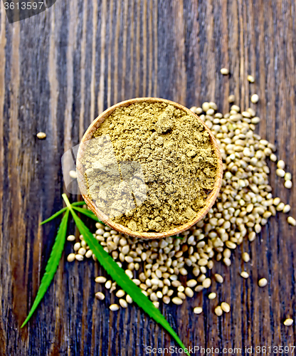 Image of Flour hemp in spoon with leaf on board