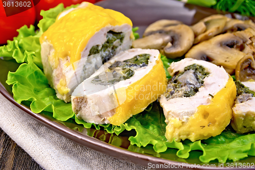 Image of Roll chicken with champignons on board