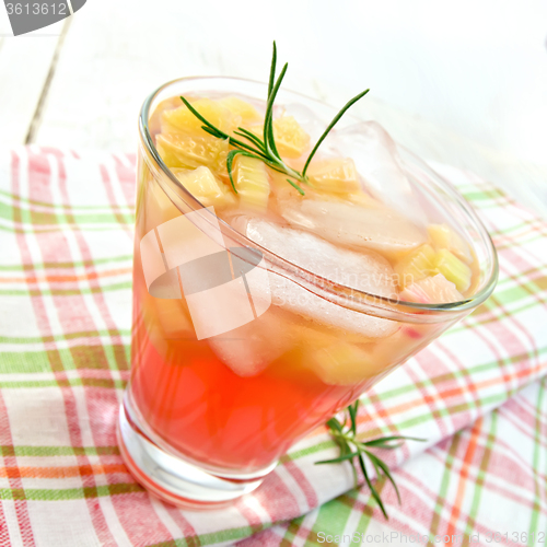 Image of Lemonade with rhubarb and rosemary on pink napkin