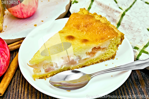 Image of Pie apple with sour cream on dark board