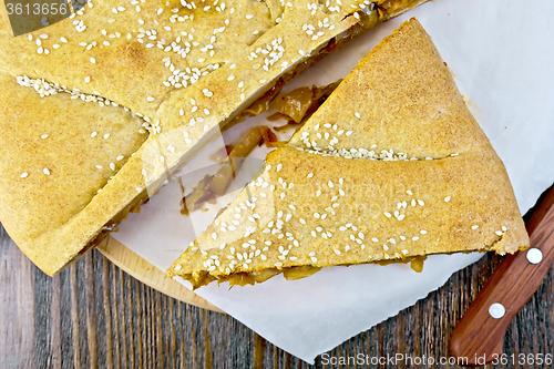 Image of Pie with cabbage and sesame on parchment top