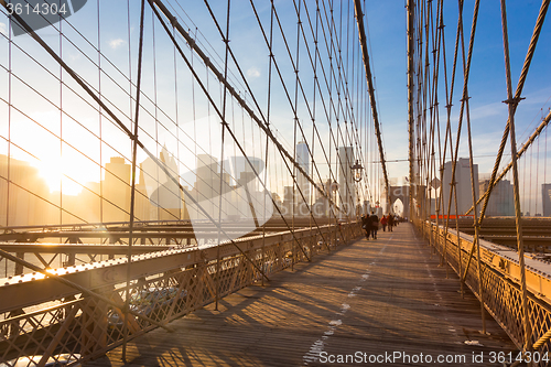 Image of Brooklyn bridge at sunset, New York City.