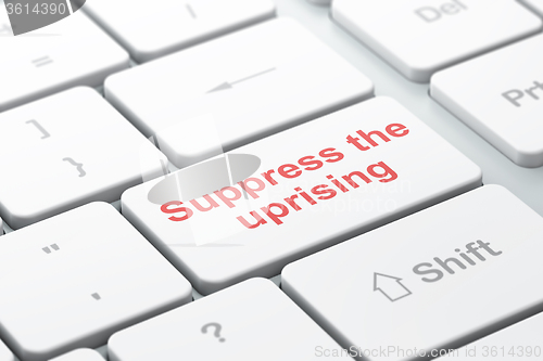 Image of Political concept: Suppress The Uprising on computer keyboard background