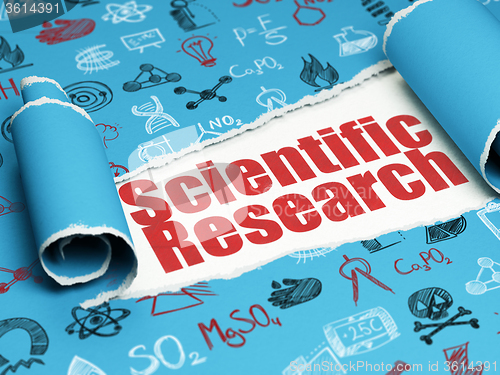 Image of Science concept: red text Scientific Research under the piece of  torn paper