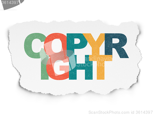 Image of Law concept: Copyright on Torn Paper background