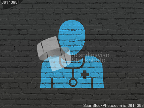 Image of Medicine concept: Doctor on wall background
