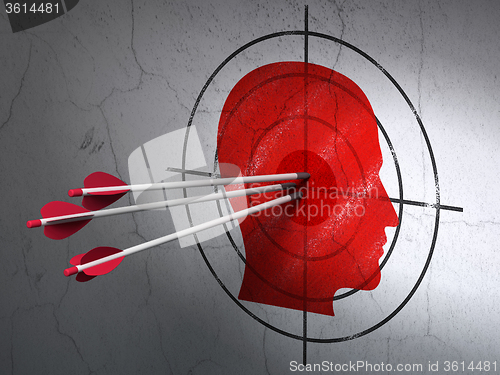 Image of Studying concept: arrows in Head target on wall background