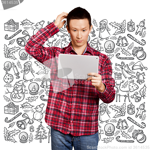 Image of Man Looking For Christmas Gifts