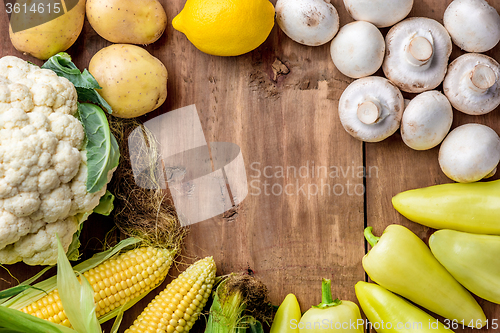 Image of The multicolored vegetables on wooden table